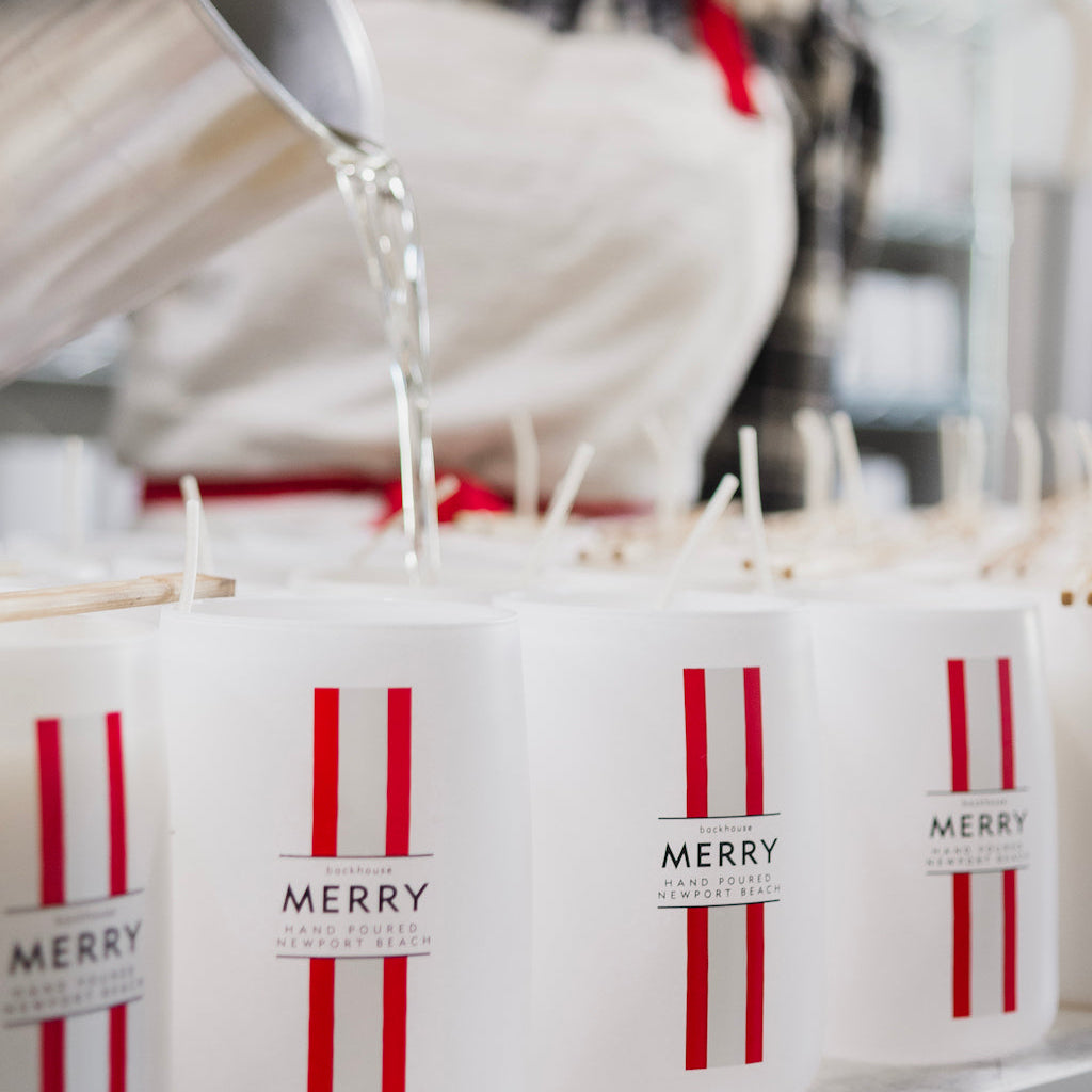 Pouring Holiday Candle | white + red merry jar