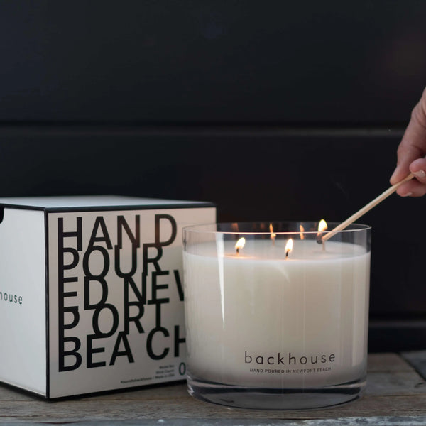 Luxury 4-wick candle with sandalwood and amber notes