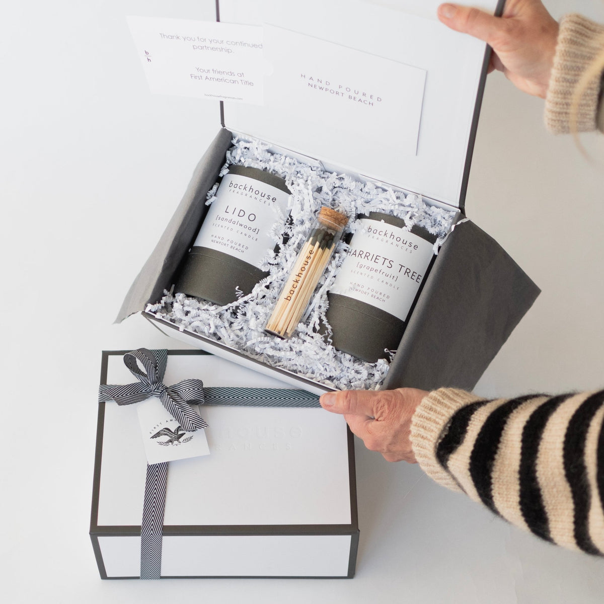 Backhouse Fragrances Duo Candle Gift Box with Lido sandalwood and Harriets Tree grapefruit candles, First American Title corporate gift unboxing