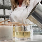 backhouse fragrances hand-pouring large luxury candle Newport Beach California studio during the production process
