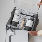 Backhouse Fragrances open Ultimate Candle Gift Box with Lido, Harriets Tree, Colony candles and matches, custom branded for TJ Homes