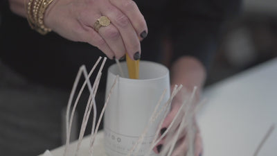Making the backhouse candle in a candle making studio
