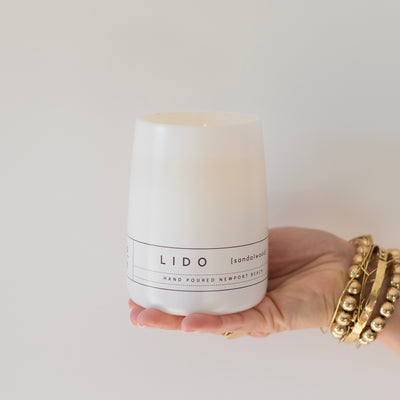 backhouse lido sandalwood candle burning in a modern farmhouse birthday gift newport beach